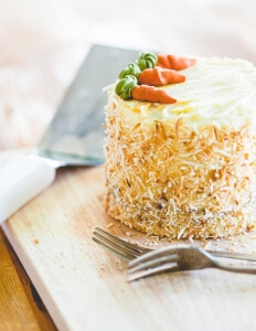 Picture of a carrot cake with carrot decorations